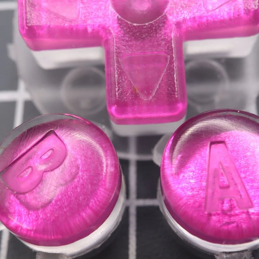 Hand cast custom resin buttons for Nintendo Game Boy Advance - Chrome pink | Lab Fifteen Co - Image 4